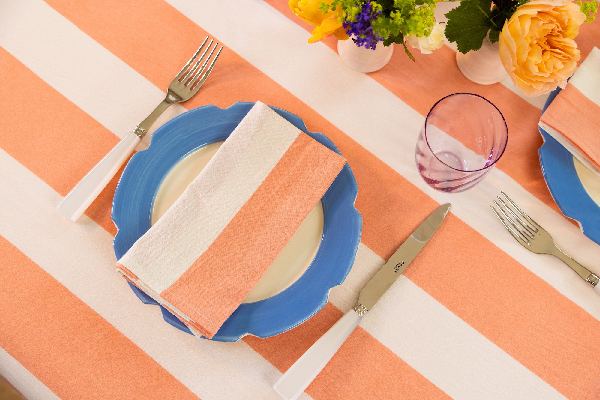 Peach and white striped napkin and table cloth
