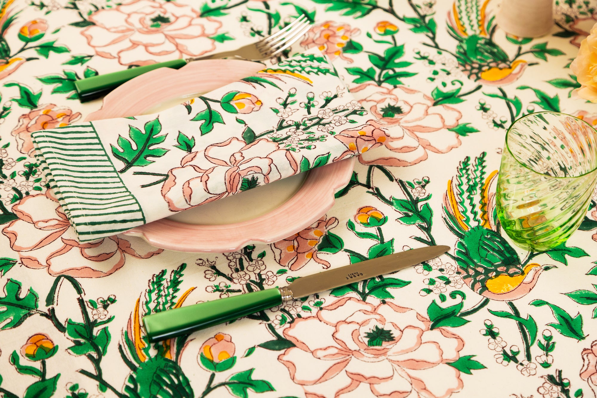 Pink, green and peach tropical paradise print tablecloth and napkins